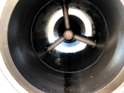 A close-up of the three pipe gussets on one of the 16” diameter V-Cones.