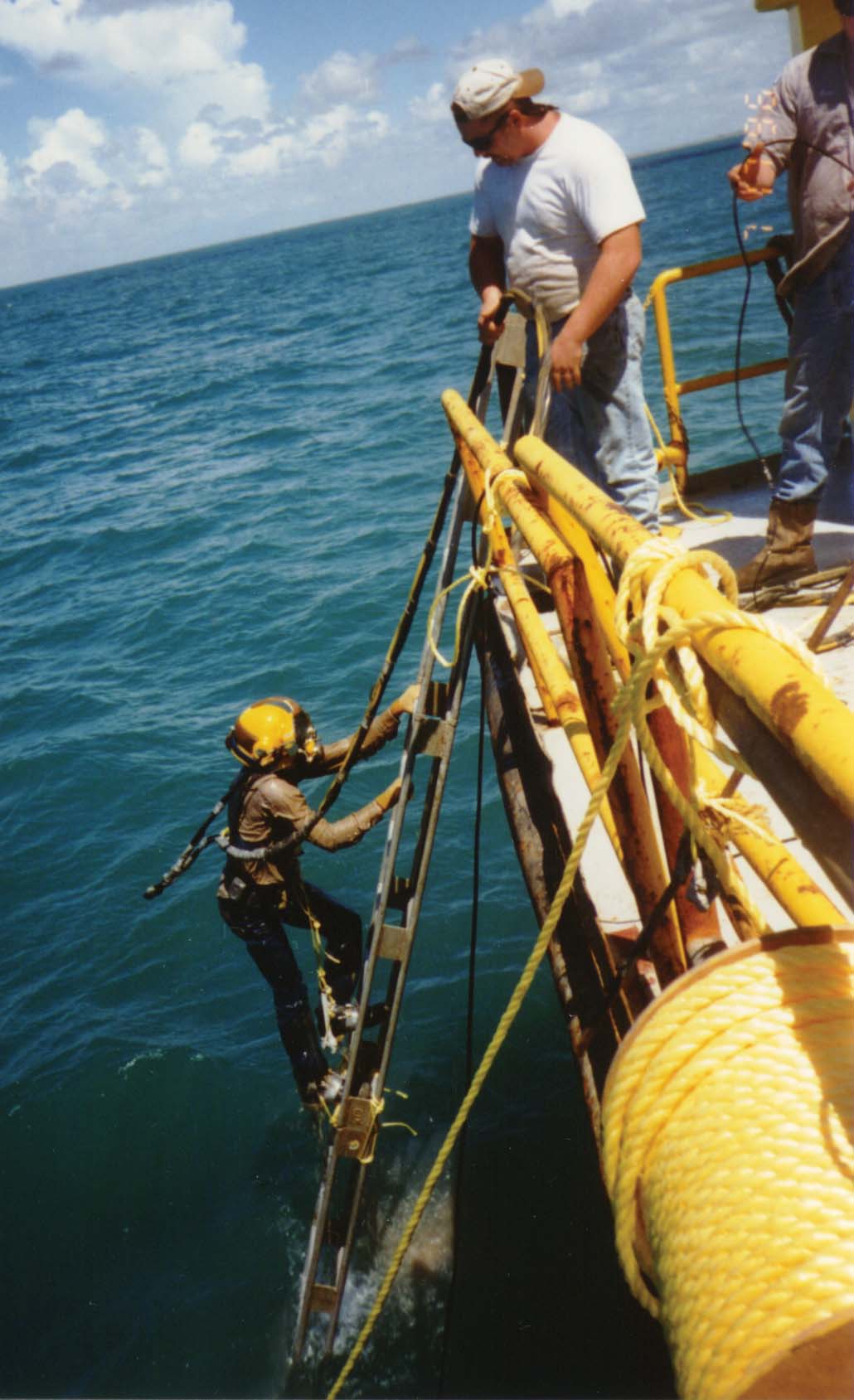 Divers Testing Brine Lines